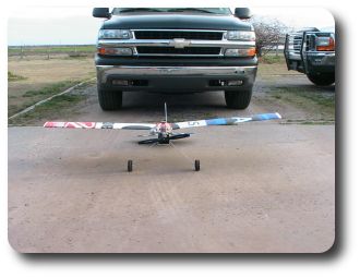  The wingspan is 60 inches.  I placed the plane in front of the Chevy Tahoe for scale comparison.